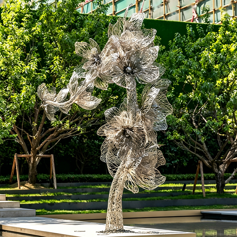 Blossoms in Bloom gennembrudt rustfrit stål blomstertræ skulptur